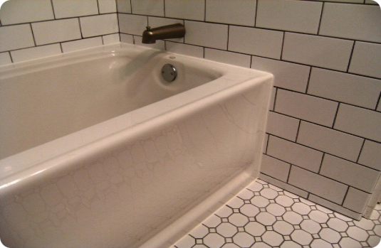 Subway tile throughout the tub surround and walls revitalized this bathroom.